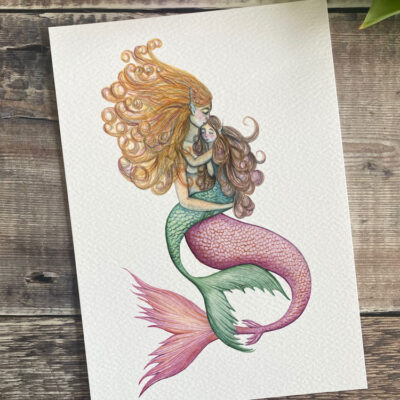 mermaid with pink tail cuddling merchild with green child