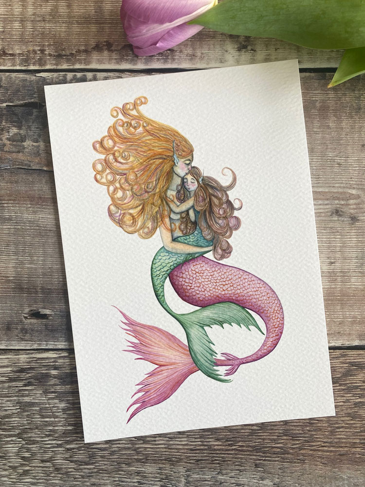 mermaid with pink tail cuddling merchild with green child