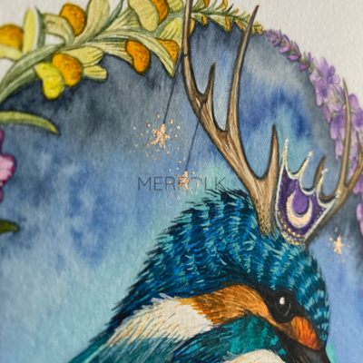 kingfisher art with metallic stars hanging from antlers