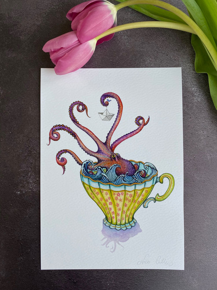 purple kraken holding a paper boat in a vintage teacup