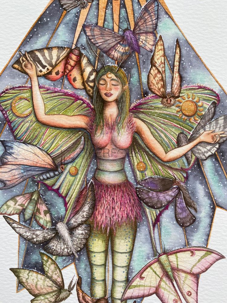 close up of fairy print with moths and moon